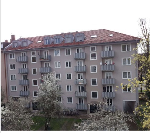a building with trees in the background