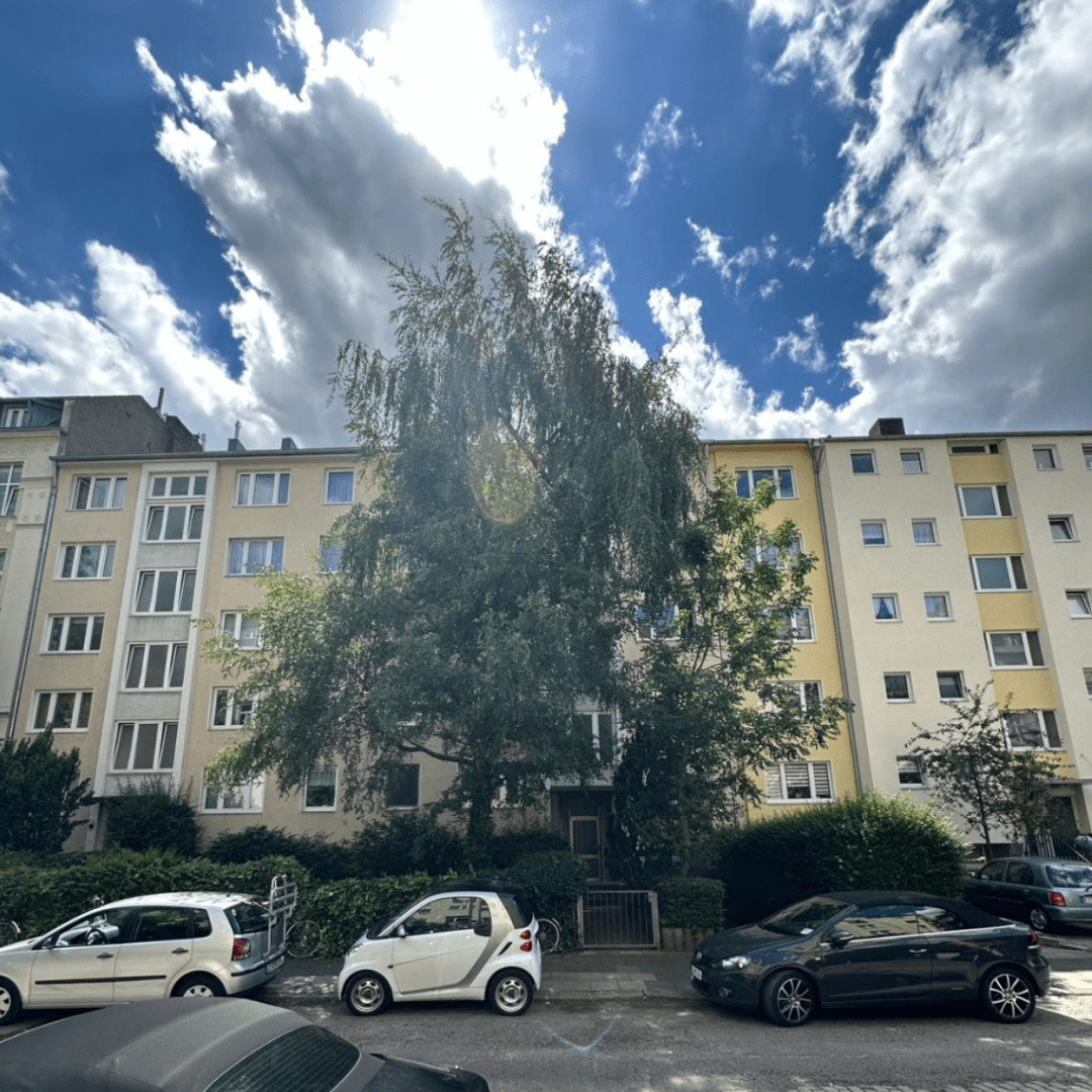 a building with cars parked in front of it