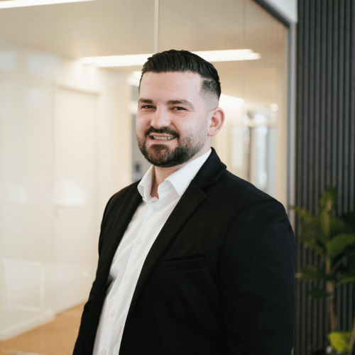 Agon Bublica a man in a black suit