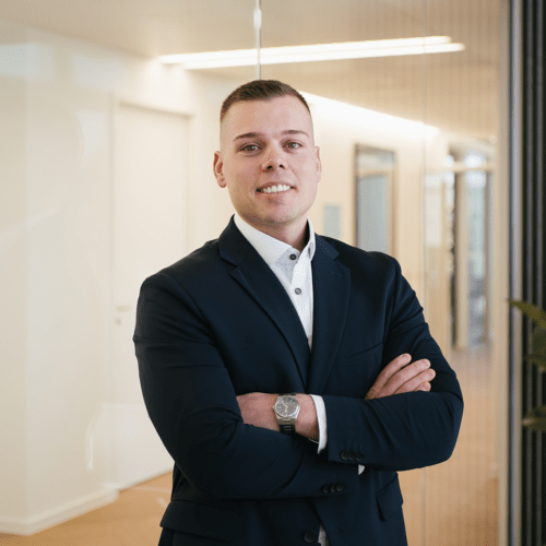 Michael Diem a man in a suit with his arms crossed