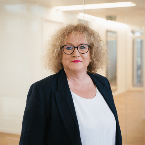 Susanne Hauner a woman in a white suit